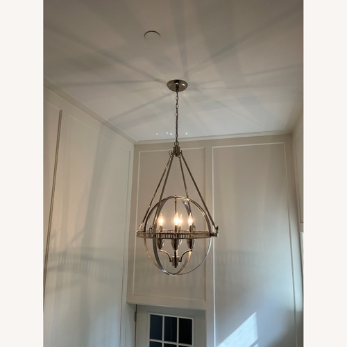 Used Elk Hemisphere 4 light Chandelier for sale on AptDeco
