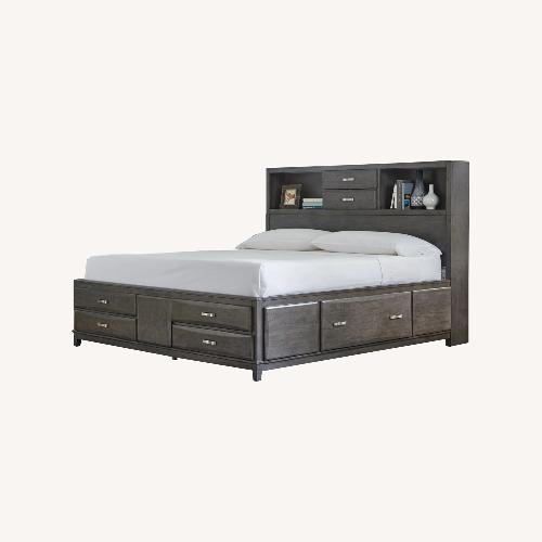 Used Ashley Furniture Caitbrook Queen Storage Bed with 8 Drawers for sale on AptDeco
