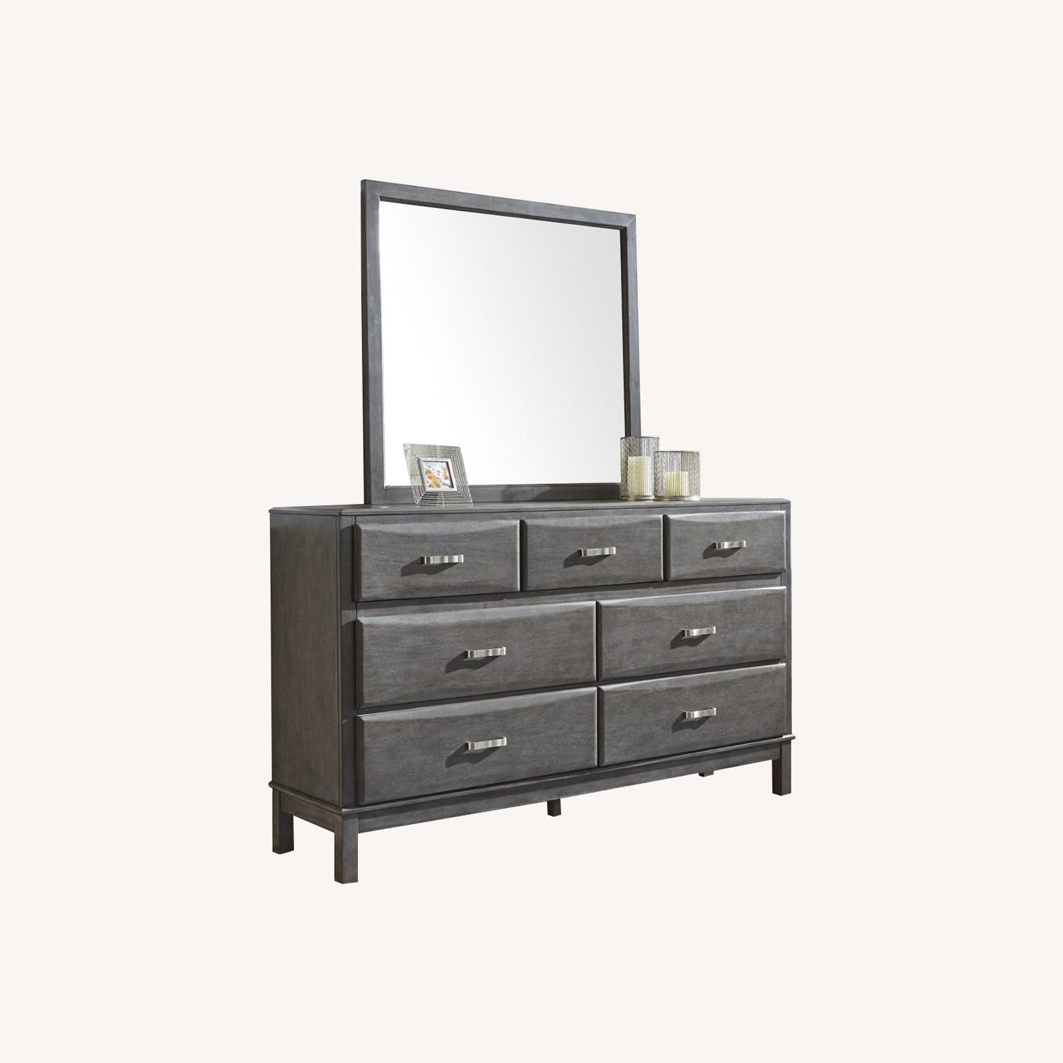 Ashley Furniture Caitbrook 7 Drawer Dresser and Mirror - image-0