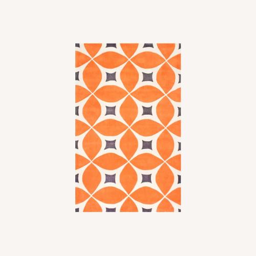 Used Gabriela Contemporary Deep Orange 9 ft. x 12 ft. Area Rug for sale on AptDeco