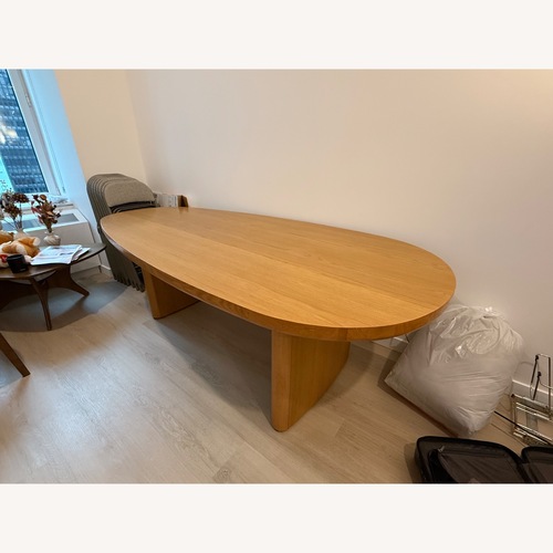 Used Article Baarlo Oak Dining Table for sale on AptDeco