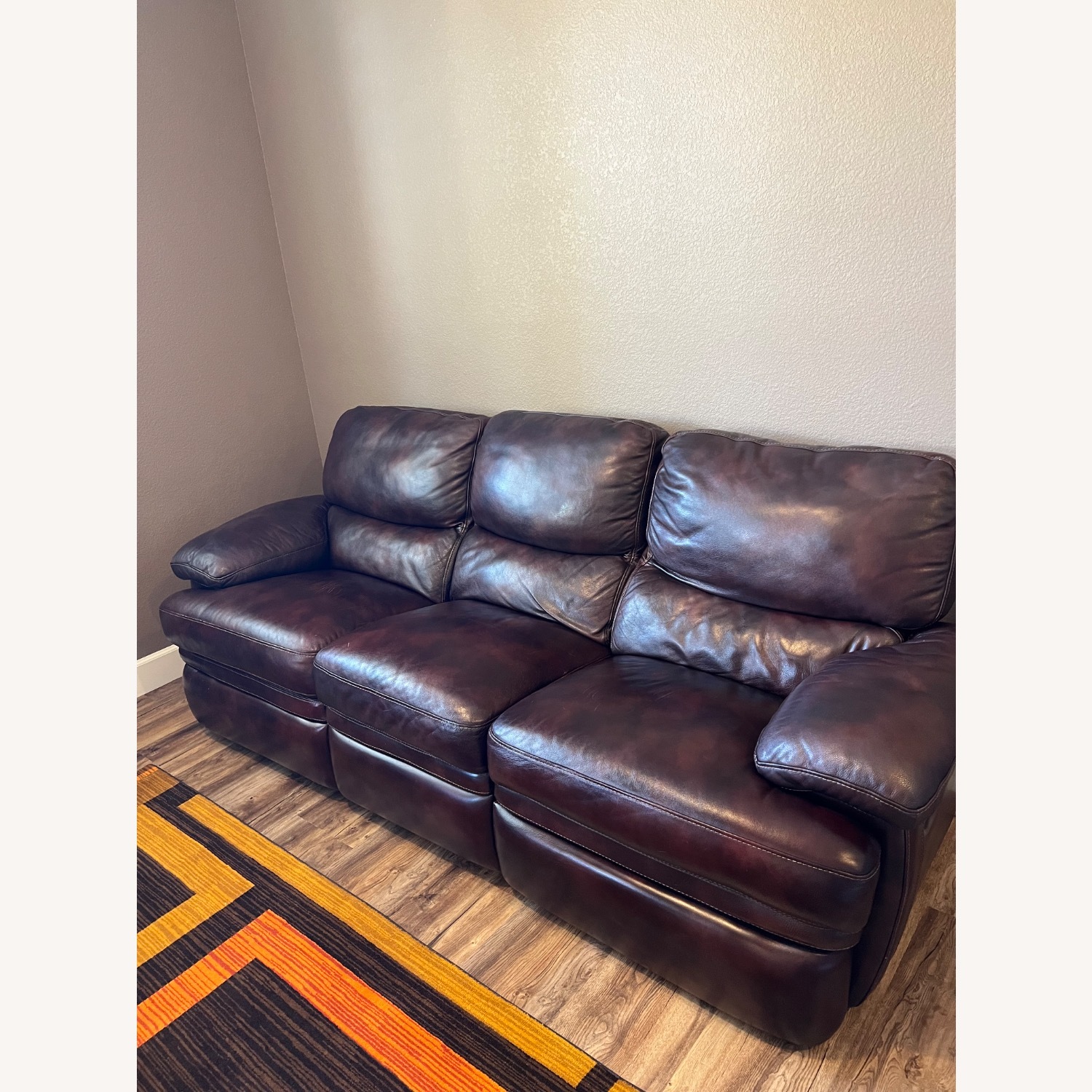 Natuzzi Leather Reclining Couch - image-1