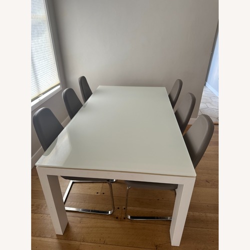 Used Sigma Glass Extendable Dining Table for sale on AptDeco