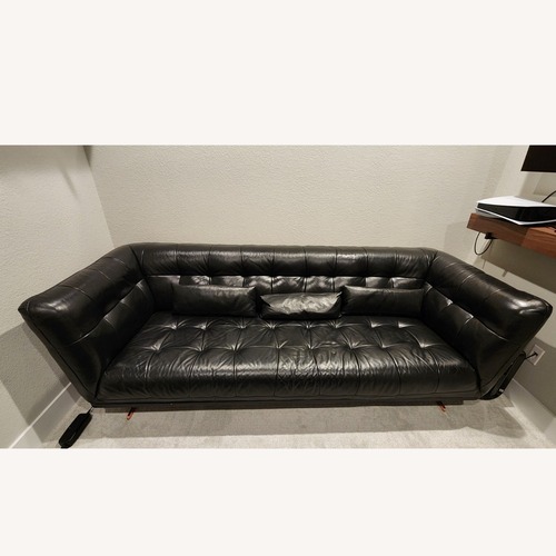 Used Modern High Back Tufted Black Leather Couch for sale on AptDeco