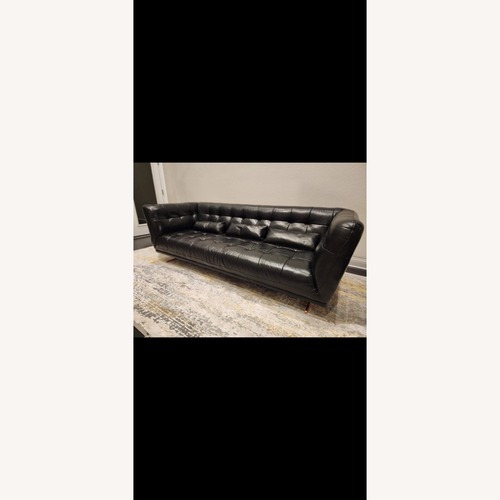 Used Modern High Back Tufted Black Leather Couch for sale on AptDeco