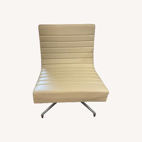 Used Vintage Leather On Metal Base Lounge Chair for sale on AptDeco