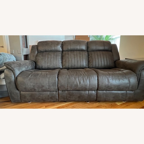 Used Spivey Collection Dark Gray Double Reclining Sofa for sale on AptDeco