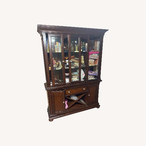 Used Dark Brown Armoire With Built-in Lights for sale on AptDeco