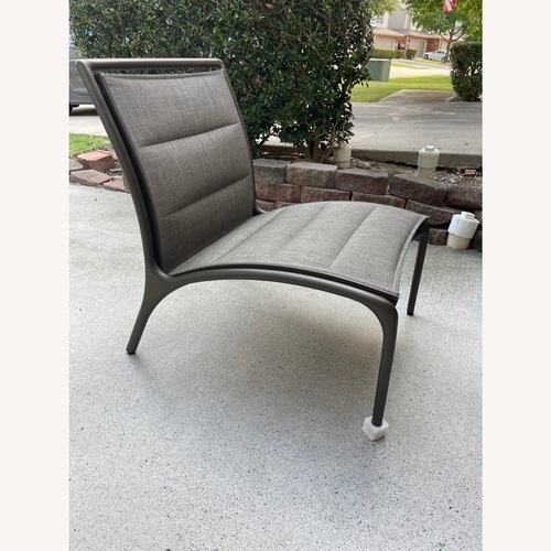 Used Woodard patio chair cushioned  for sale on AptDeco