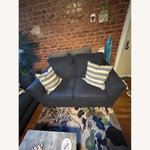 Used Raymour & Flanigan Blue Loveseat for sale on AptDeco