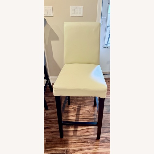 Used Grandin Road Valencia Bar Stool (1 Ivory, 2 Navy) for sale on AptDeco