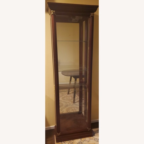Used Tall Slim Curio China Display Cabinet for sale on AptDeco
