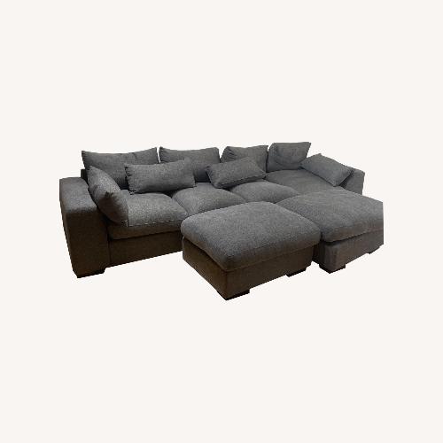 Used Dark Gray Upholstered Sofa for sale on AptDeco