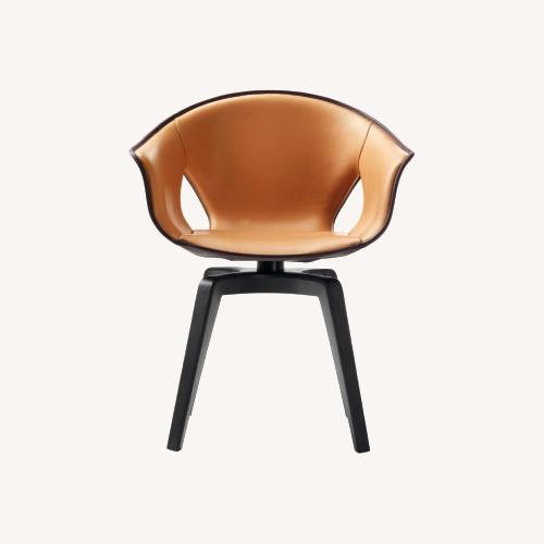 Used Poltrona Frau Roberto Lazzeroni Swivel Armchair  for sale on AptDeco