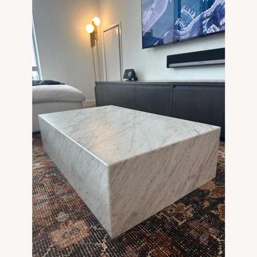 Used Audi Copenhagen Plinth Low Marble Table – Carrara for sale on AptDeco