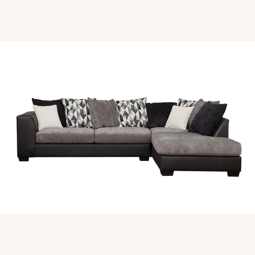 Used Grey and Black Sectional  for sale on AptDeco