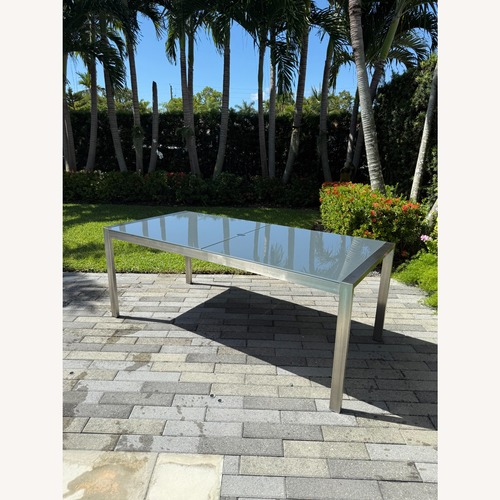 Used Dune Dining Table W Charcoal Glass for sale on AptDeco