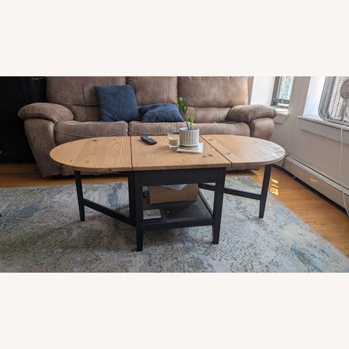 Used IKEA ARKELSTORP Expandable Coffee Table – Black with Pine for sale on AptDeco