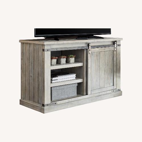Used Ashley Carynhurst 50" TV Stand for sale on AptDeco