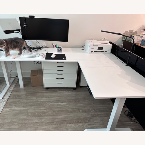 Used Autonomous L-Shaped Sit Stand Desk for sale on AptDeco