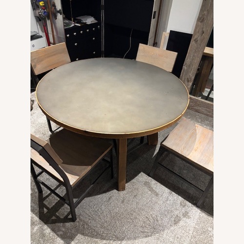 Used RH Zinc Trestle Round Dining Table for sale on AptDeco