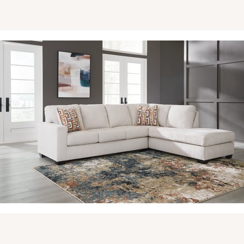 Used Ashley Aviemore Gray Sectional Sofa for sale on AptDeco