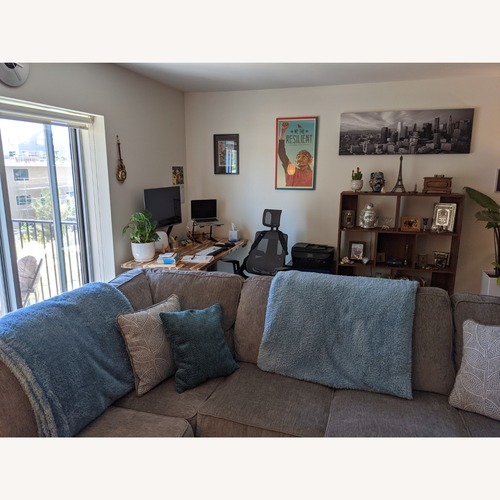 Used Ashley Aviemore Gray Sectional Sofa for sale on AptDeco