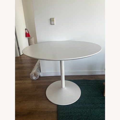 Used CB2 Odyssey White Dining Table  for sale on AptDeco
