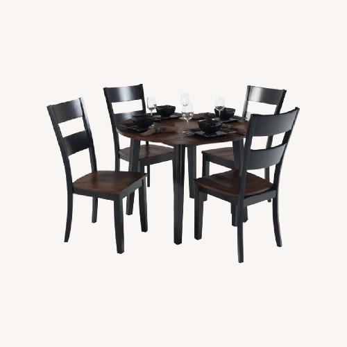 Used Bob's Blake Round Extendable Dining Table Set for sale on AptDeco