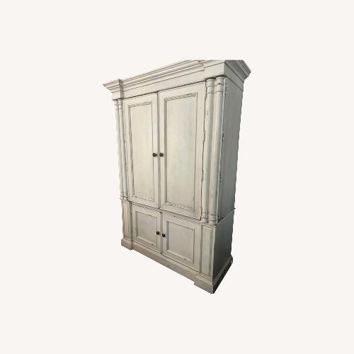 Used Distressed Off White Armoire for sale on AptDeco