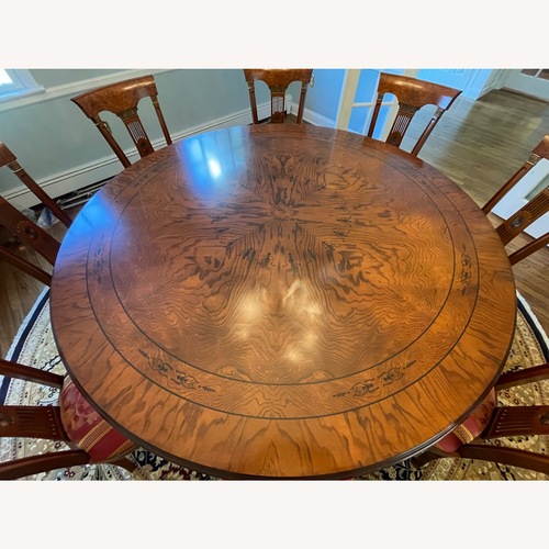 Used Round Mahoghany Formal Dining Table for sale on AptDeco