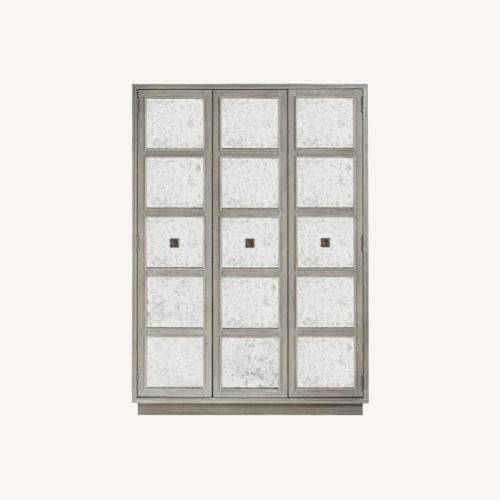 Used Universal Playlist  Antiquish Mirrored Armoire for sale on AptDeco