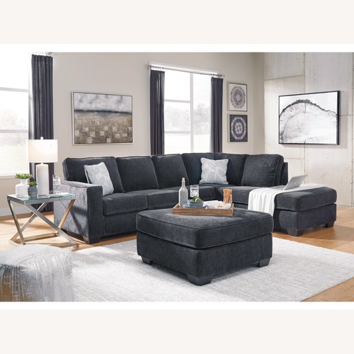 Used Ashley Altari 2-Piece Sleeper Sectional with Chaise for sale on AptDeco