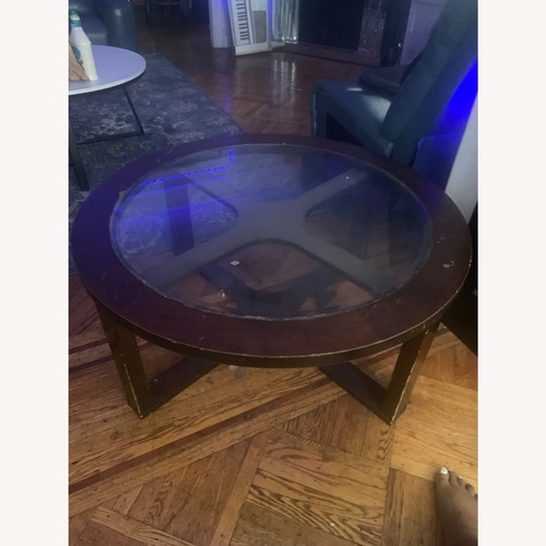 Used Round Coffe Wood Table With Glass for sale on AptDeco