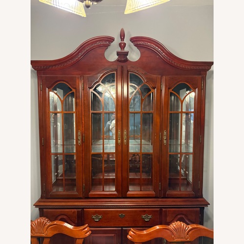 Used Cherry Wood Finished China Cabinet for sale on AptDeco