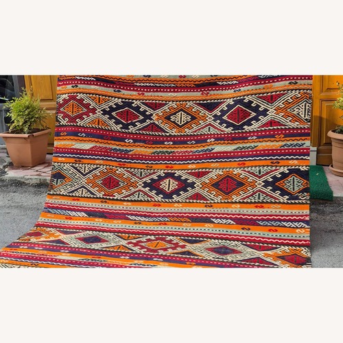 Used Turkish Textural Kilim Sunbaked Orange/Pomegranate for sale on AptDeco