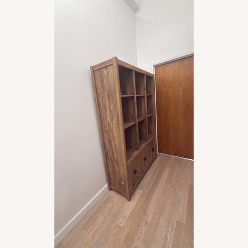Used Sauder Storage Wall Sindoori Mango Finish for sale on AptDeco