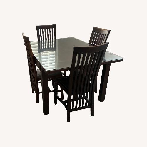 Used Información Teakwood Diining Table for sale on AptDeco