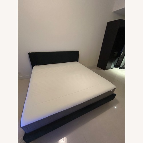 Used IKEA King Size Bed + Bed Frame for sale on AptDeco