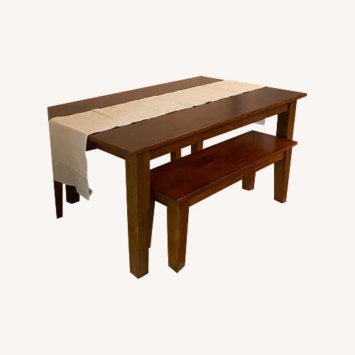 Used Crate & Barrel Basque Honey Brown Solid Wood Bench for sale on AptDeco
