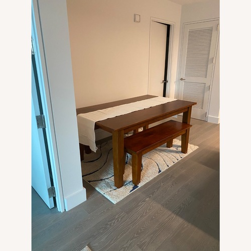 Used Crate & Barrel Basque Honey Brown Solid Wood Bench for sale on AptDeco