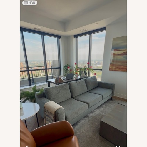 Used Huppe Teal and Grey 3 seater couch for sale on AptDeco