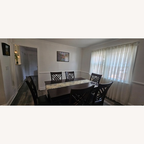 Used Dining Set with 8 Chairs for sale on AptDeco