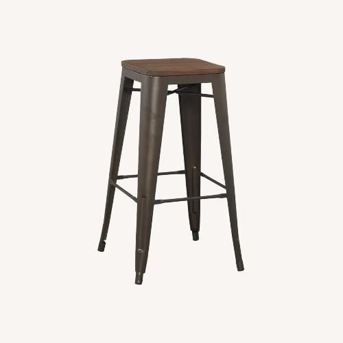 Used 4 Metal/Wood Barstools for sale on AptDeco