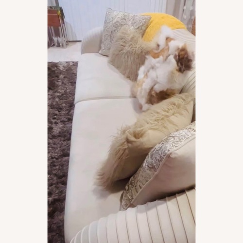 Used TOV Furniture Elegant Cream Pleaded Sofa for sale on AptDeco