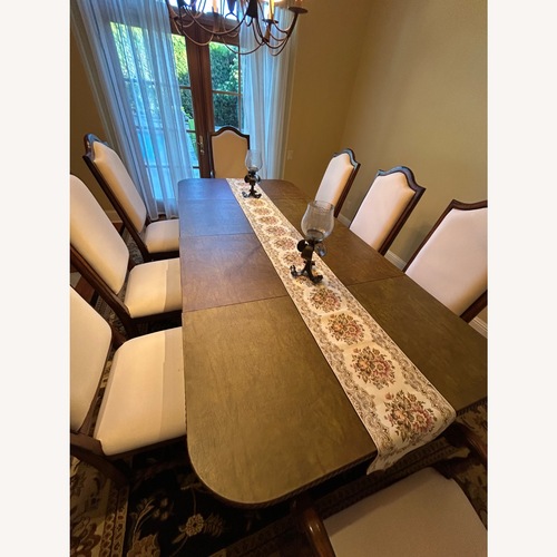 Used Elegant Solid Wood 9-Piece Dining Set – Seats 8 for sale on AptDeco