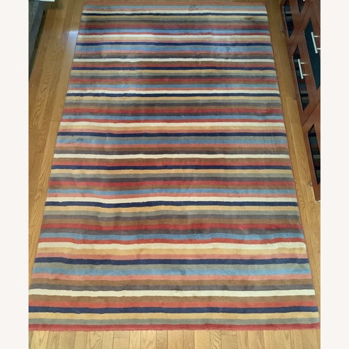 Used Multi-color Area Rug for sale on AptDeco