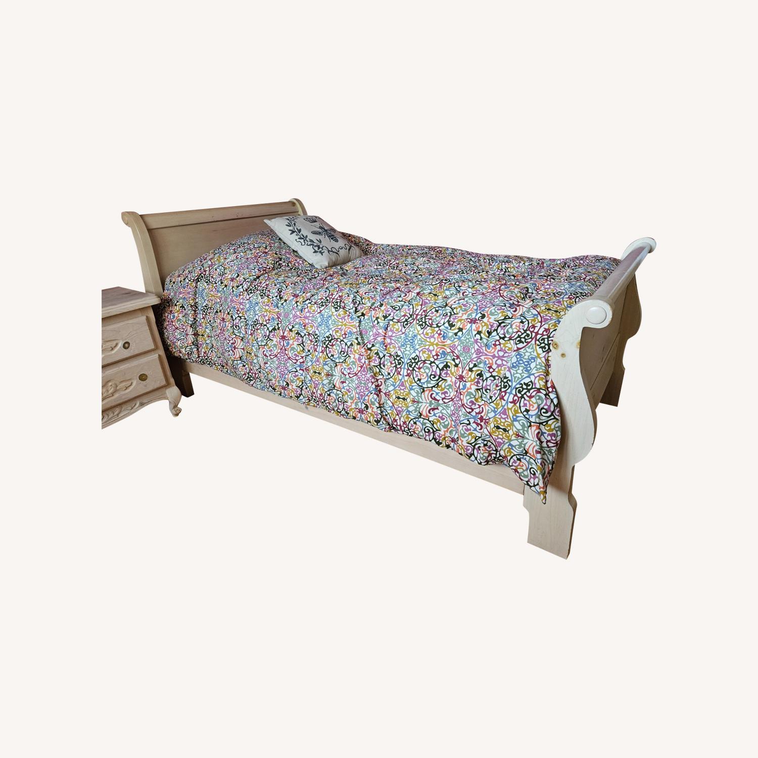 Huffman Koos Natural Pine Twin Sleigh Bed - image-0