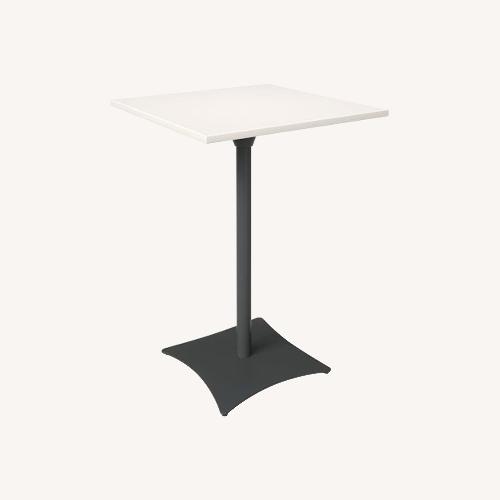 Used  West Elm Simii Scene Table with 3 Stools for sale on AptDeco