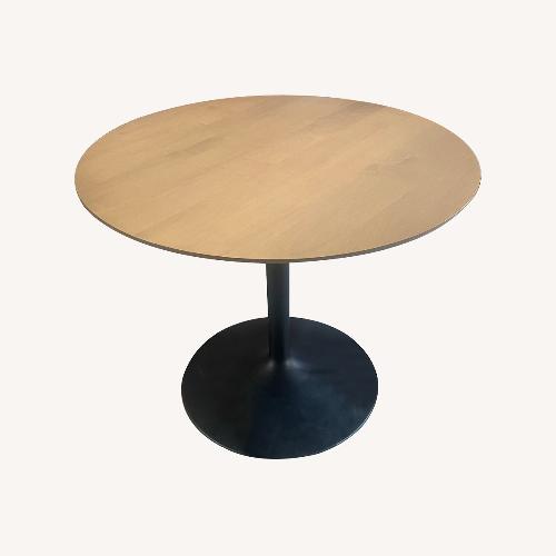 Used Room & Board Round Dining Table for sale on AptDeco